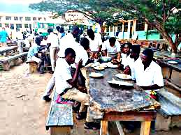 Read more about the article Oti Boateng SHS students compete with birds for space as they dine under trees